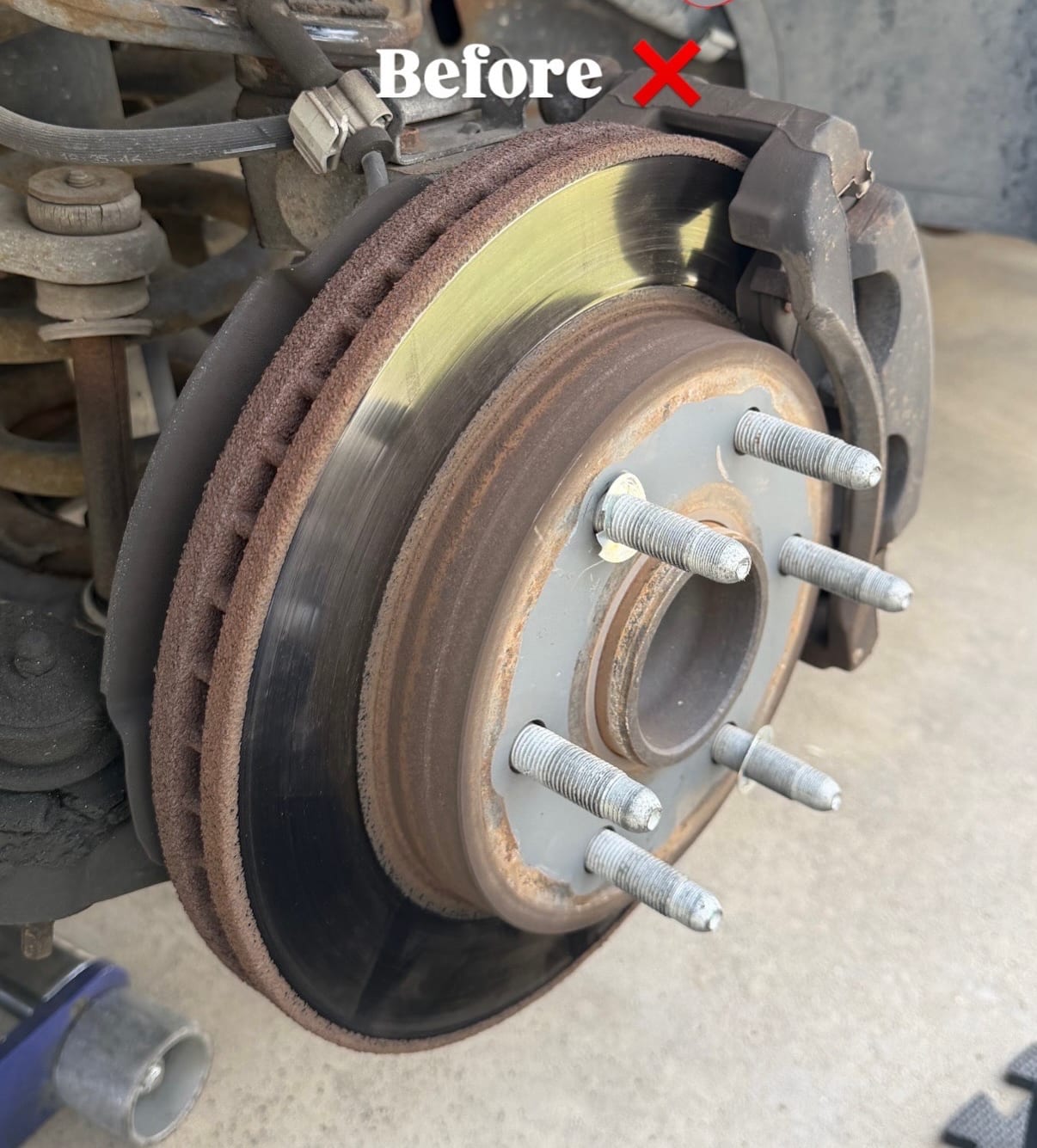 Worn brake rotor before service